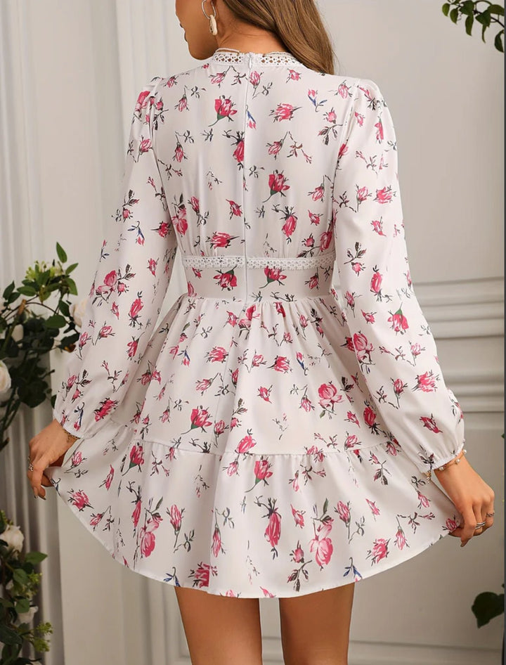Women's floral mini dress featuring balloon sleeves and a crochet lace V-neck, perfect for summer outings and warm weather occasions. 3