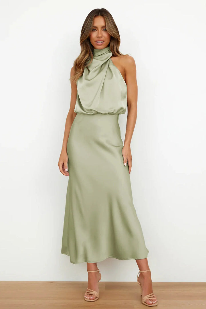 Women's halter evening dress featuring a flowing silhouette, perfect for summer cocktail parties and formal events. 0