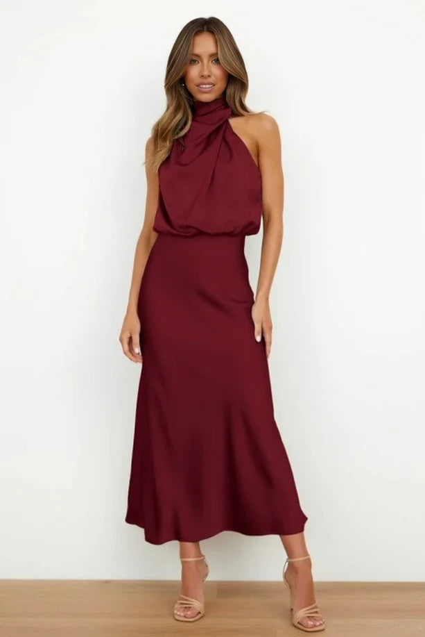 Women's halter evening dress featuring a flowing silhouette, perfect for summer cocktail parties and formal events. 10