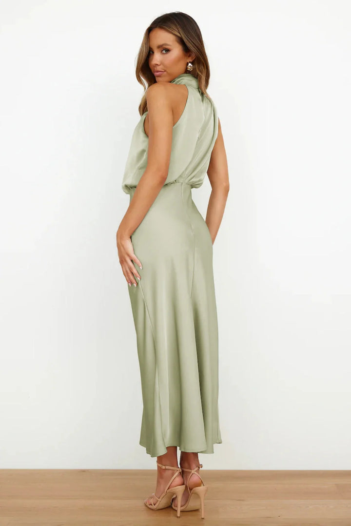 Women's halter evening dress featuring a flowing silhouette, perfect for summer cocktail parties and formal events. 2