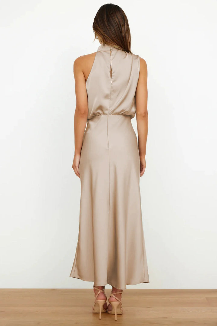Women's halter evening dress featuring a flowing silhouette, perfect for summer cocktail parties and formal events. 4