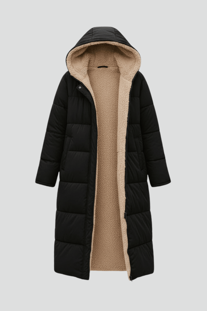 Women's hooded longline puffer coat featuring a soft fleece lining, designed for lightweight warmth and casual winter wear. 1