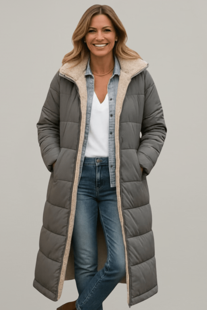Women's hooded longline puffer coat featuring a soft fleece lining, designed for lightweight warmth and casual winter wear. 5