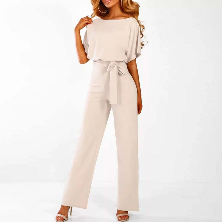Women's jumpsuit featuring an adjustable belt and short sleeves, perfect for a casual, layer-friendly outfit. 0