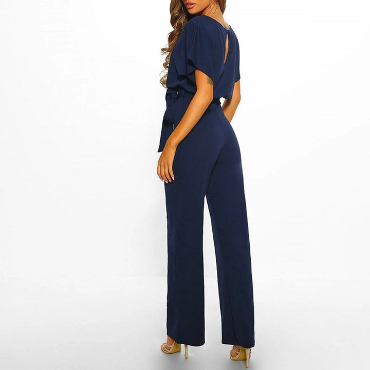 Women's jumpsuit featuring an adjustable belt and short sleeves, perfect for a casual, layer-friendly outfit. 3