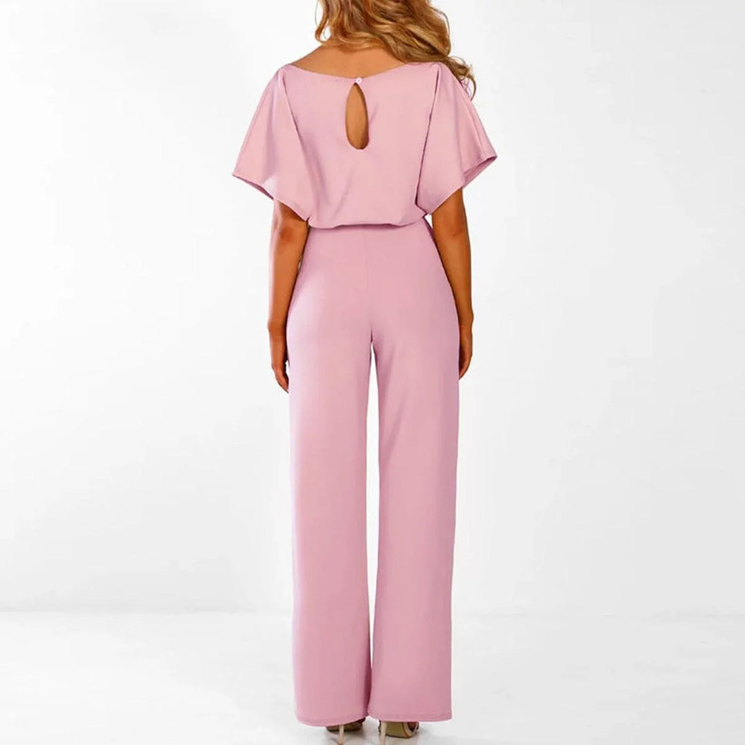 Women's jumpsuit featuring an adjustable belt and short sleeves, perfect for a casual, layer-friendly outfit. 5