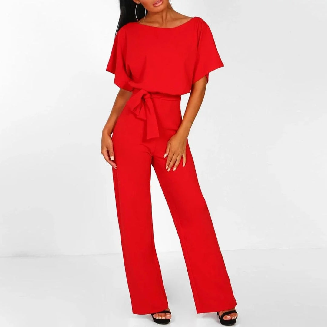 Women's jumpsuit featuring an adjustable belt and short sleeves, perfect for a casual, layer-friendly outfit. 8
