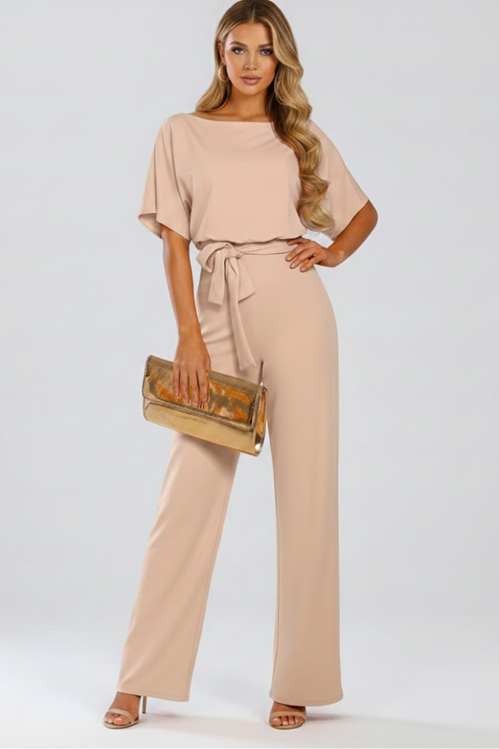 Women's black jumpsuit featuring short sleeves, a round neck, a stylish tie waist, and wide legs, perfect for casual or dressy occasions. 0