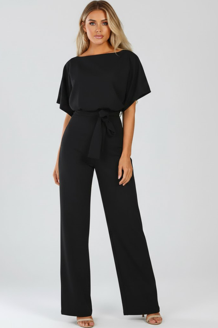 Women's black jumpsuit featuring short sleeves, a round neck, a stylish tie waist, and wide legs, perfect for casual or dressy occasions. 2