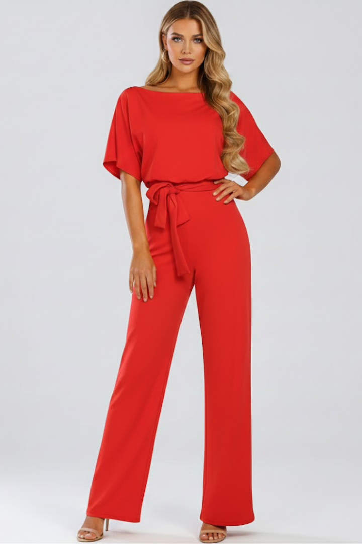 Women's black jumpsuit featuring short sleeves, a round neck, a stylish tie waist, and wide legs, perfect for casual or dressy occasions. 5