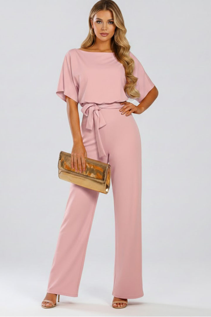 Women's black jumpsuit featuring short sleeves, a round neck, a stylish tie waist, and wide legs, perfect for casual or dressy occasions. 7