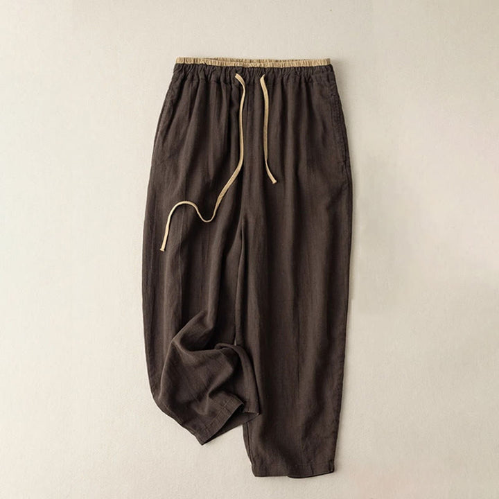 Women's linen pants featuring a comfortable drawstring and practical pockets, designed as casual long harem trousers for a relaxed and stylish look. 5