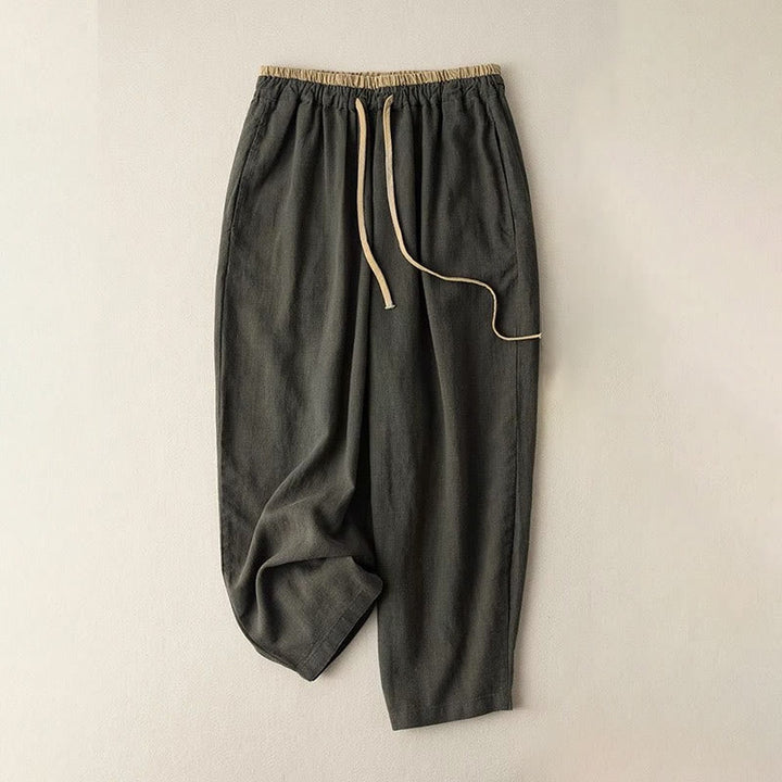 Women's linen pants featuring a comfortable drawstring and practical pockets, designed as casual long harem trousers for a relaxed and stylish look. 6