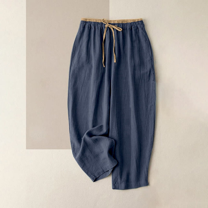 Women's linen pants featuring a comfortable drawstring and practical pockets, designed as casual long harem trousers for a relaxed and stylish look. 7