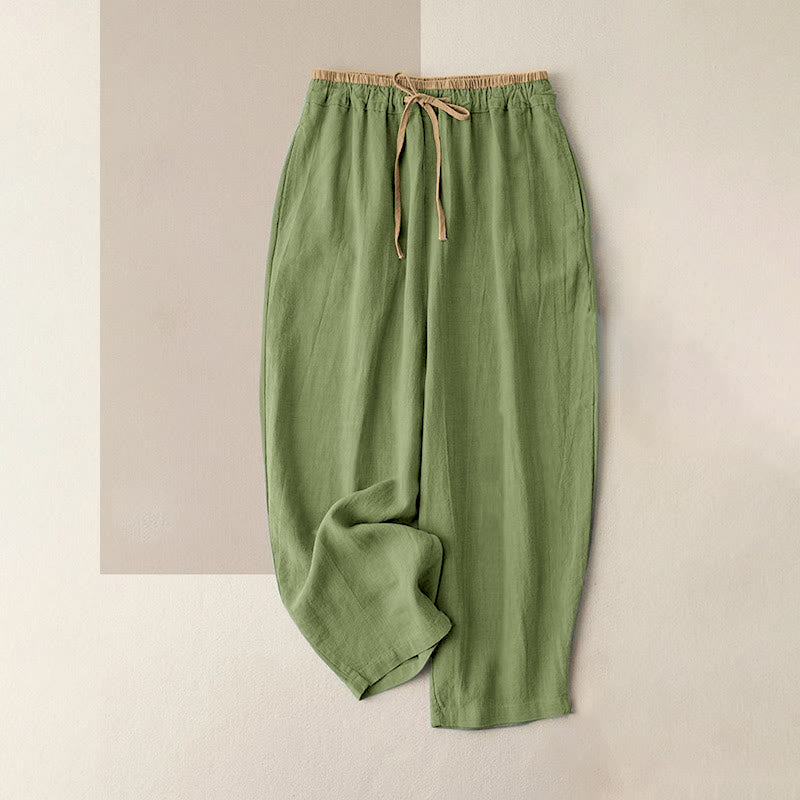 Women's linen pants featuring a comfortable drawstring and practical pockets, designed as casual long harem trousers for a relaxed and stylish look. 8