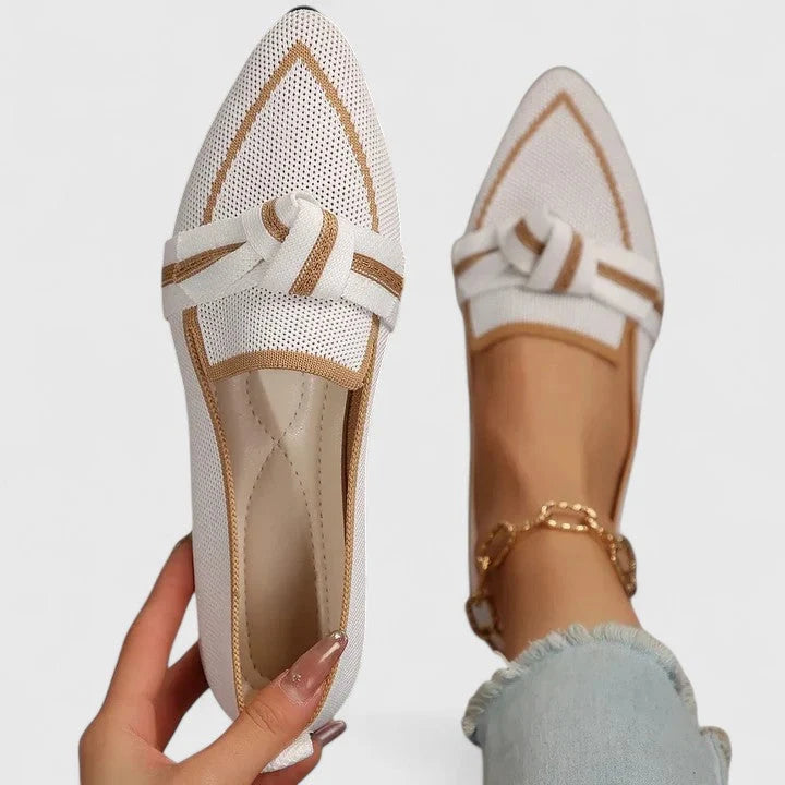 Women's loafers featuring orthopedic support and a decorative knot detail, designed with a pointed toe for an elegant look perfect for fall and winter. 0