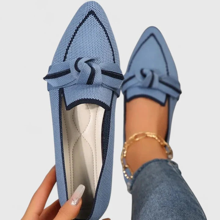 Women's loafers featuring orthopedic support and a decorative knot detail, designed with a pointed toe for an elegant look perfect for fall and winter. 1