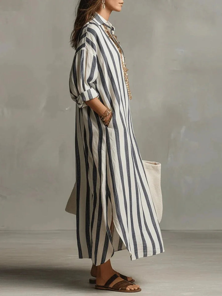 Women's striped linen maxi dress featuring adjustable roll-up sleeves, ankle-length design, and deep pockets for added convenience and style. 1