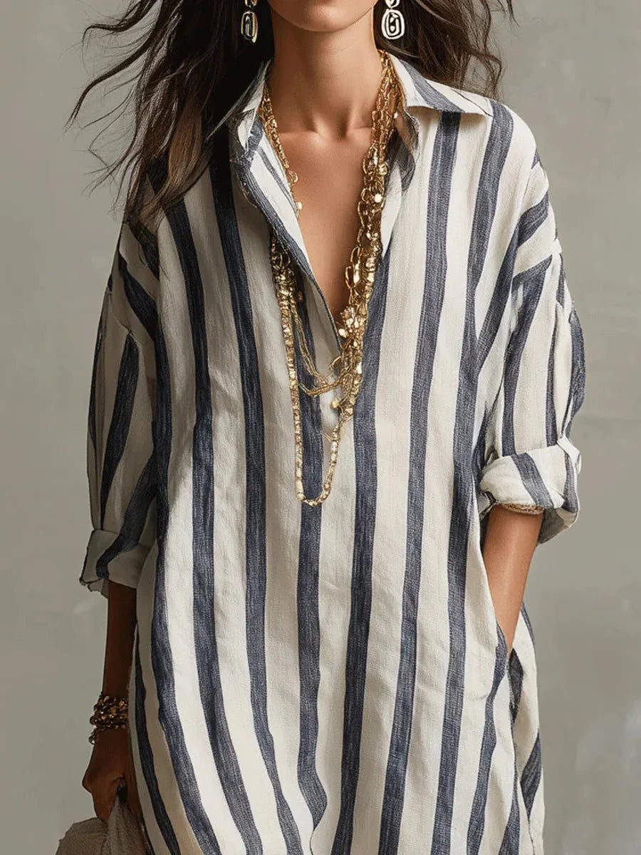 Women's striped linen maxi dress featuring adjustable roll-up sleeves, ankle-length design, and deep pockets for added convenience and style. 2