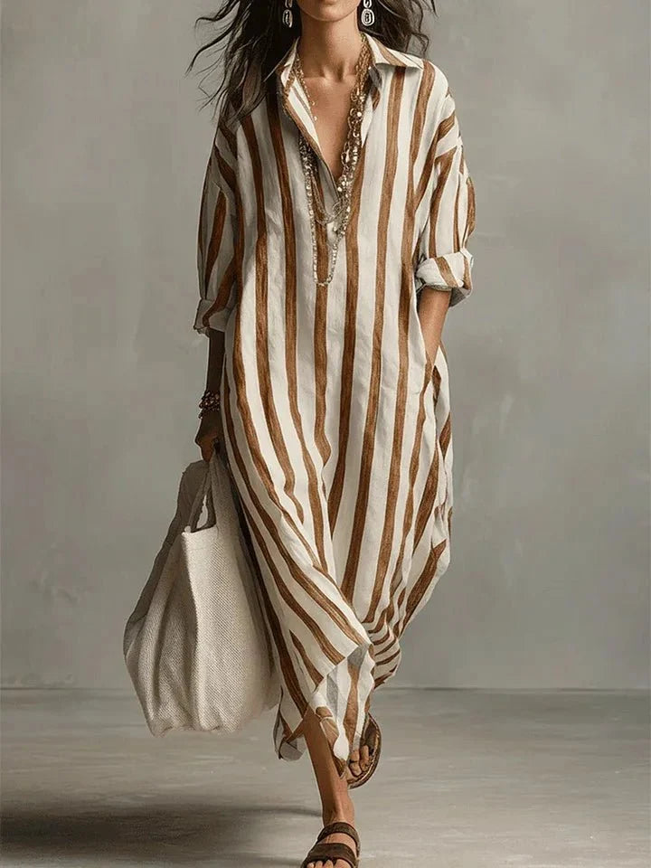Women's striped linen maxi dress featuring adjustable roll-up sleeves, ankle-length design, and deep pockets for added convenience and style. 6