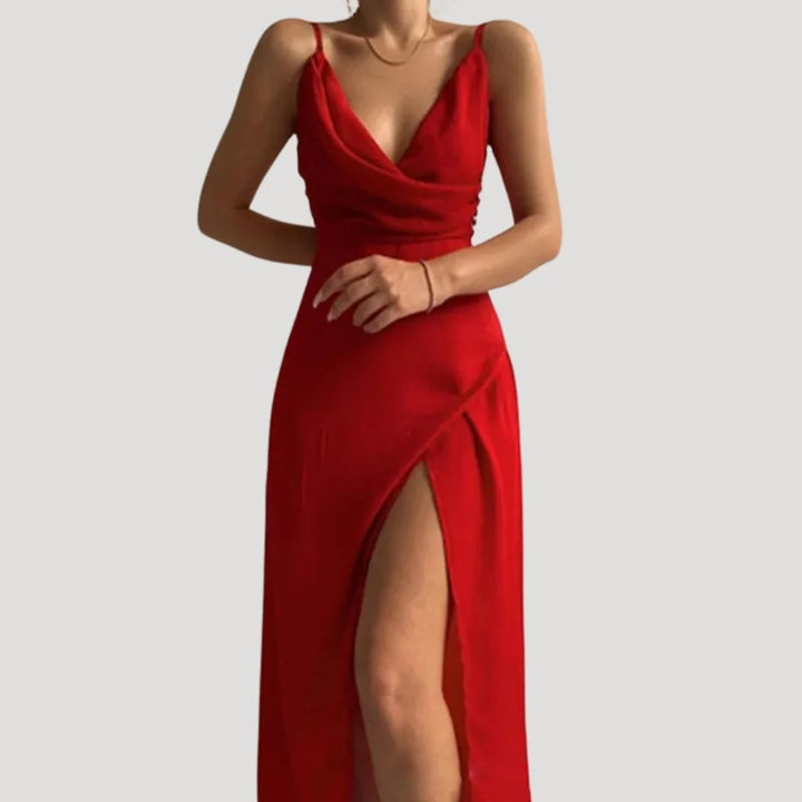 Women's maxi dress featuring an elegant slit, perfect for formal occasions, designed for a flattering long length and sophisticated style. 0
