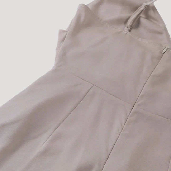 Women's maxi dress featuring an elegant slit, perfect for formal occasions, designed for a flattering long length and sophisticated style. 2