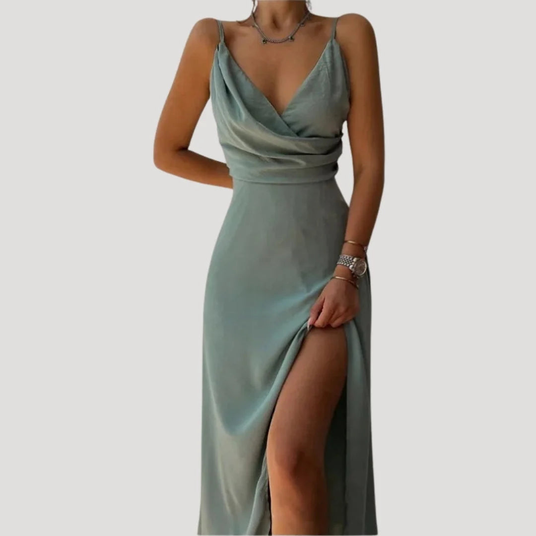Women's maxi dress featuring an elegant slit, perfect for formal occasions, designed for a flattering long length and sophisticated style. 4