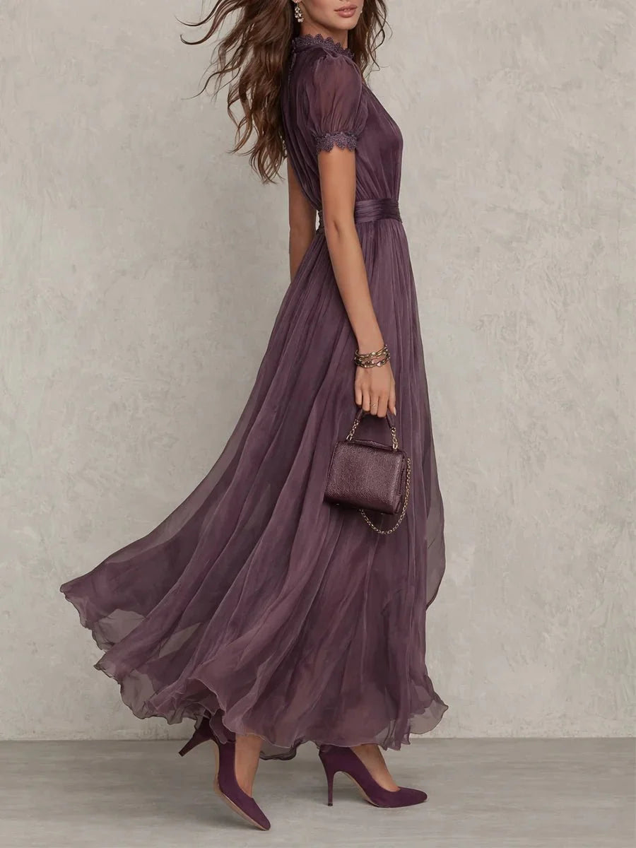 Elegant women's maxi dress featuring a keyhole neckline and a flowing chiffon skirt, perfect for formal evening occasions. 1