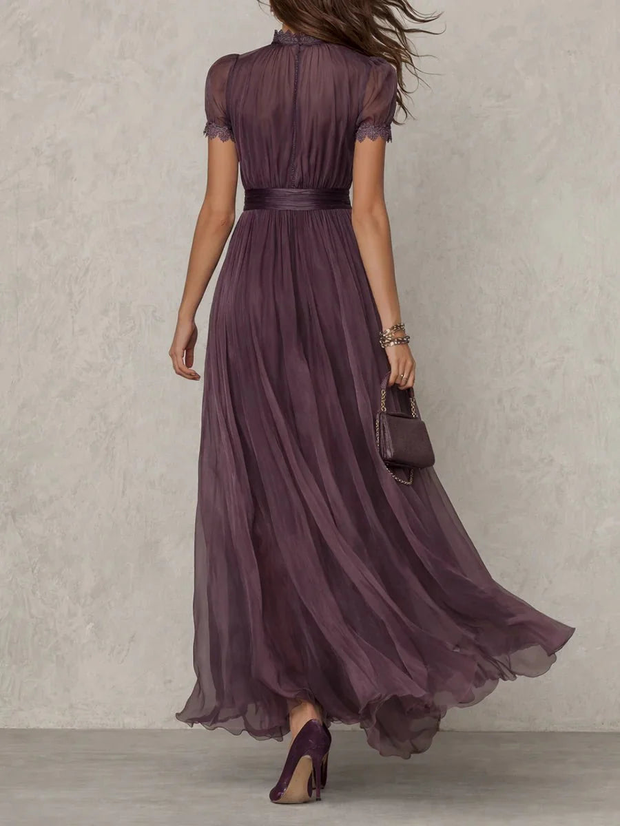Elegant women's maxi dress featuring a keyhole neckline and a flowing chiffon skirt, perfect for formal evening occasions. 2