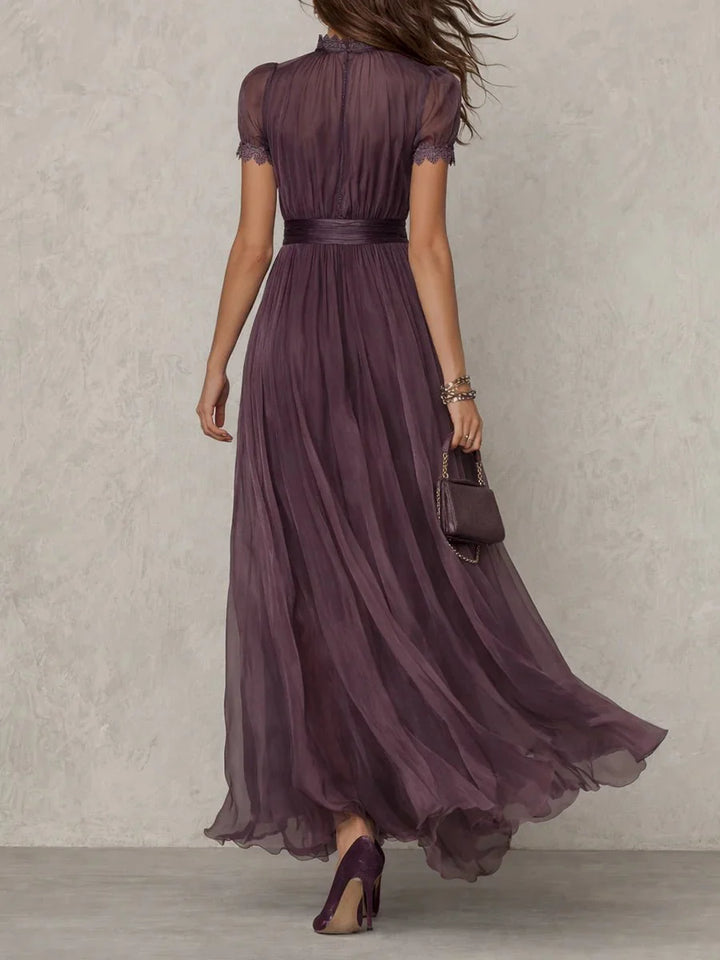 Elegant women's maxi dress featuring a keyhole neckline and a flowing chiffon skirt, perfect for formal evening occasions. 2