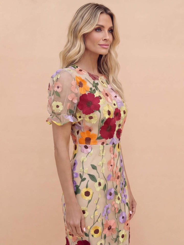 Women's plus size midi dress featuring intricate 3D floral applique design, flared skirt, and a stylish beige and pink color scheme. 2