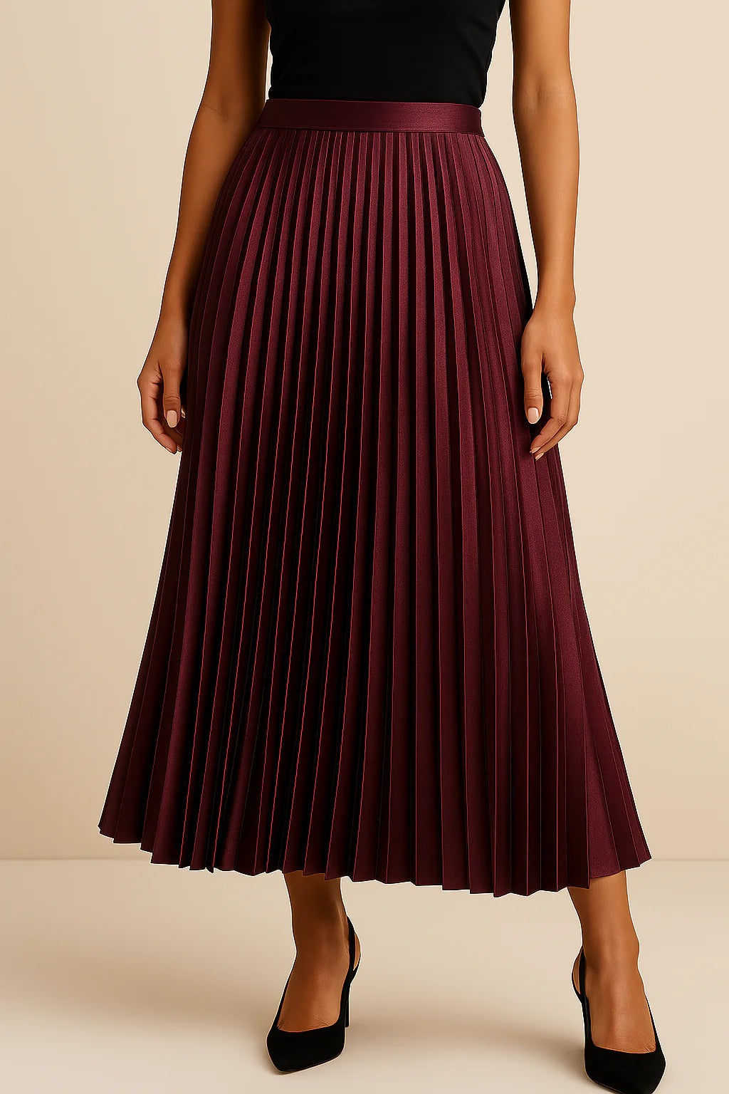Women's black satin midi skirt featuring accordion pleats and a high waist A-line design, perfect for elegant and versatile styling. 5