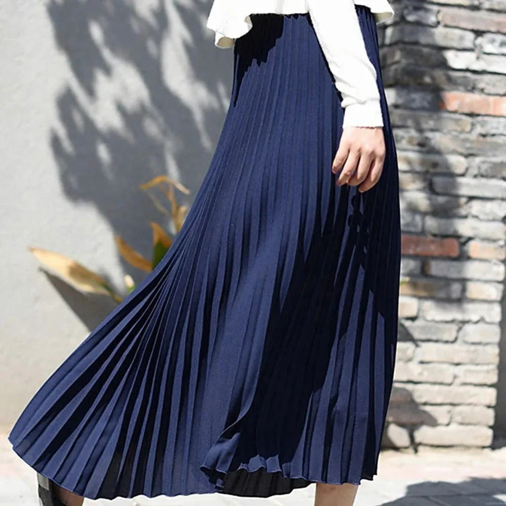 Women's black satin midi skirt featuring accordion pleats and a high waist A-line design, perfect for elegant and versatile styling. 6