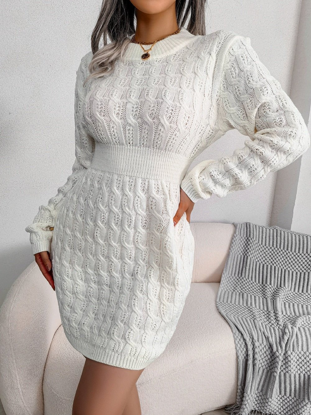 Women's mini dress featuring a fitted waist, long gathered sleeves, and a stylish textured cable knit design, perfect for casual outings and special occasions. 2