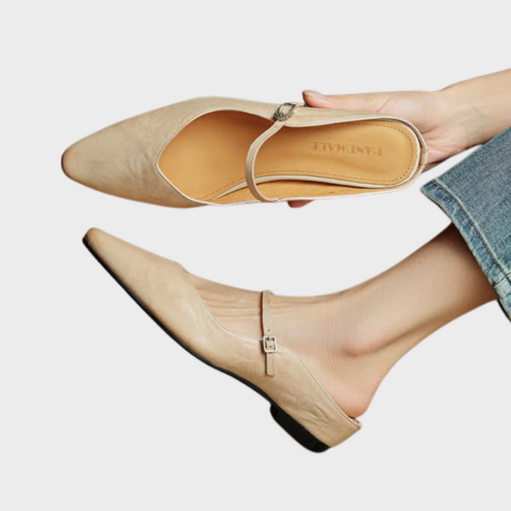 Women's mules shoes featuring a padded footbed, crafted from genuine leather, designed for both casual and formal wear with a stylish slip-on design. 0