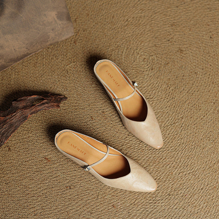 Women's mules shoes featuring a padded footbed, crafted from genuine leather, designed for both casual and formal wear with a stylish slip-on design. 4