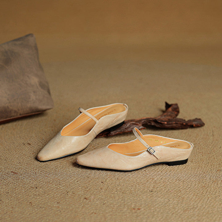 Women's mules shoes featuring a padded footbed, crafted from genuine leather, designed for both casual and formal wear with a stylish slip-on design. 5
