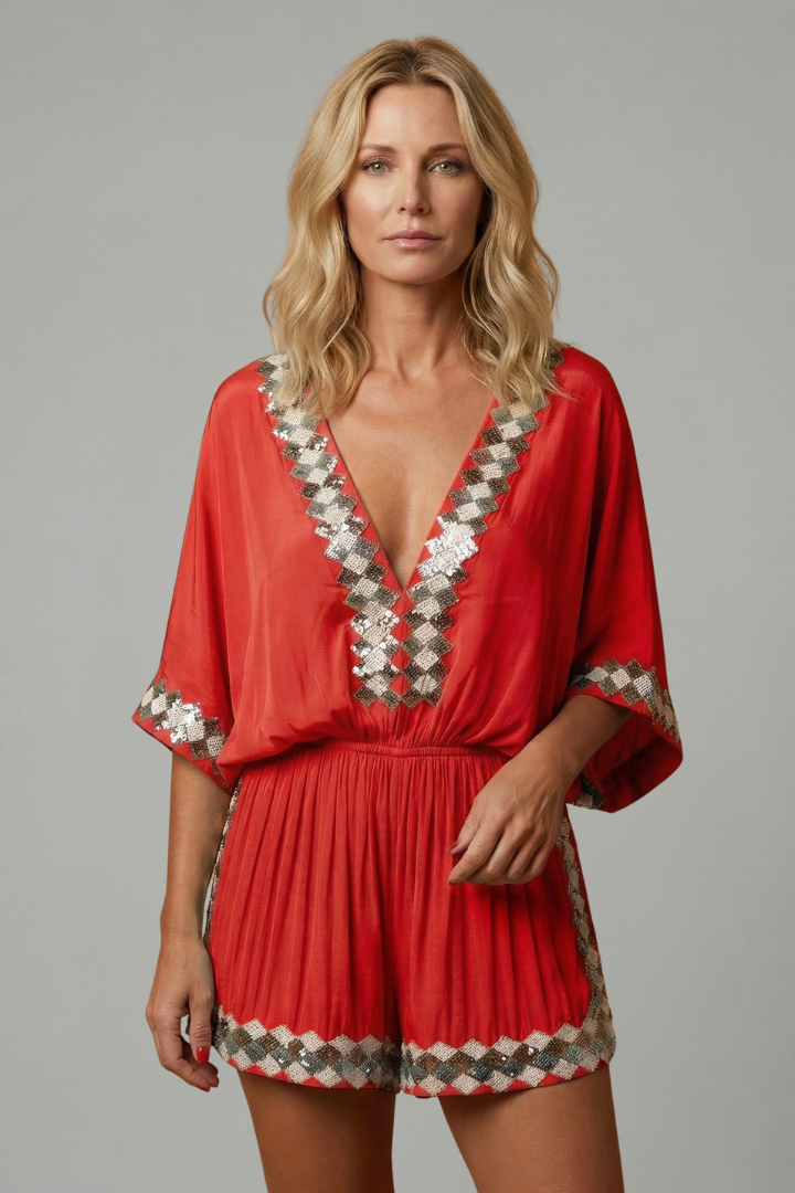 Women's sky blue playsuit featuring a smocked waist and V-neck design, lightweight fabric with elegant embroidery, perfect for summer outings. 6