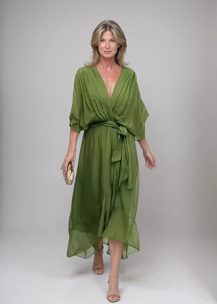 Women's plus size V-neck midi dress featuring a stylish waist belt, designed in lightweight polyester for an elegant formal look. 2