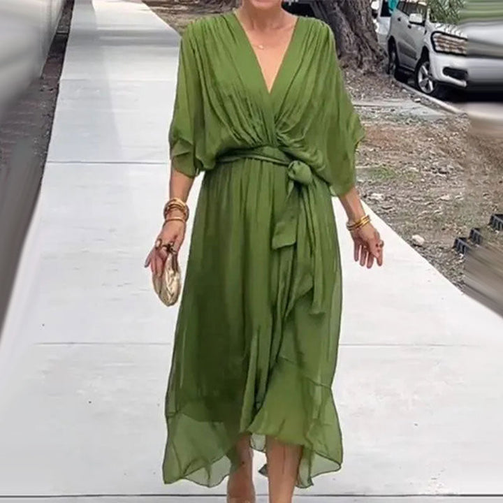 Women's plus size V-neck midi dress featuring a stylish waist belt, designed in lightweight polyester for an elegant formal look. 3