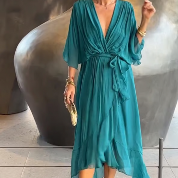 Women's plus size V-neck midi dress featuring a stylish waist belt, designed in lightweight polyester for an elegant formal look. 6