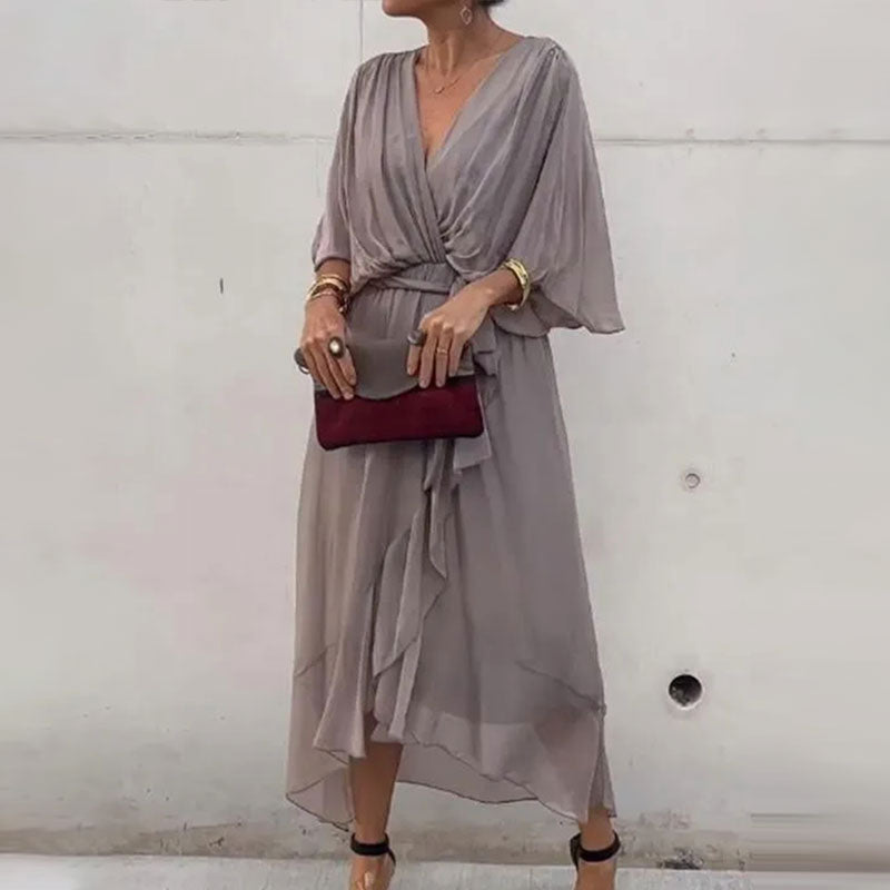 Women's plus size V-neck midi dress featuring a stylish waist belt, designed in lightweight polyester for an elegant formal look. 8