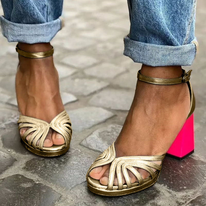 Women's sandals featuring an adjustable ankle strap, open-toe design, and classic leather mid-height heels, perfect for stylish summer outings. 0