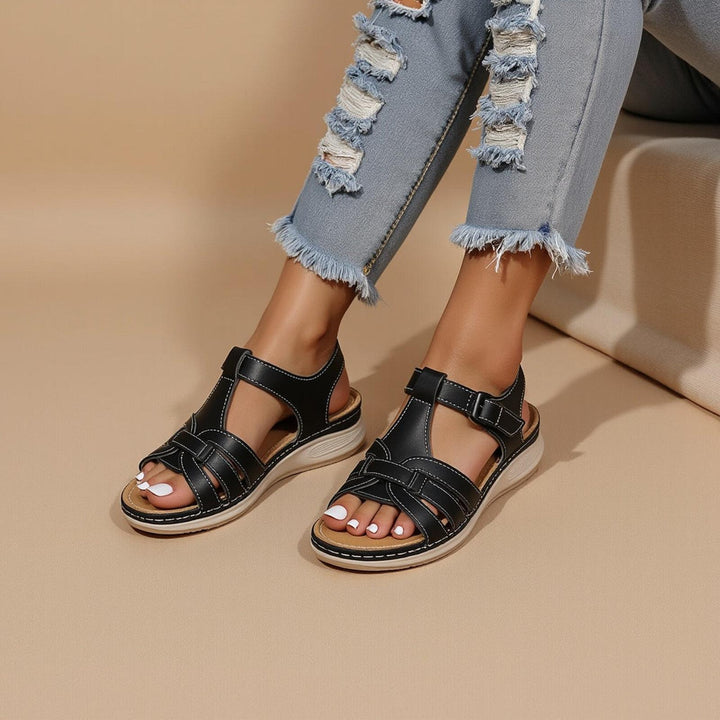 Women's sandals featuring a stylish braided strap design, adjustable fit for comfort, and orthopedic support, perfect for summer wear. 2