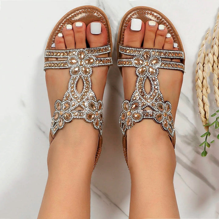 Women's boho sandals featuring a cushioned sole and textured outsole, designed for casual comfort in earthy tones, perfect for summer outings. 10