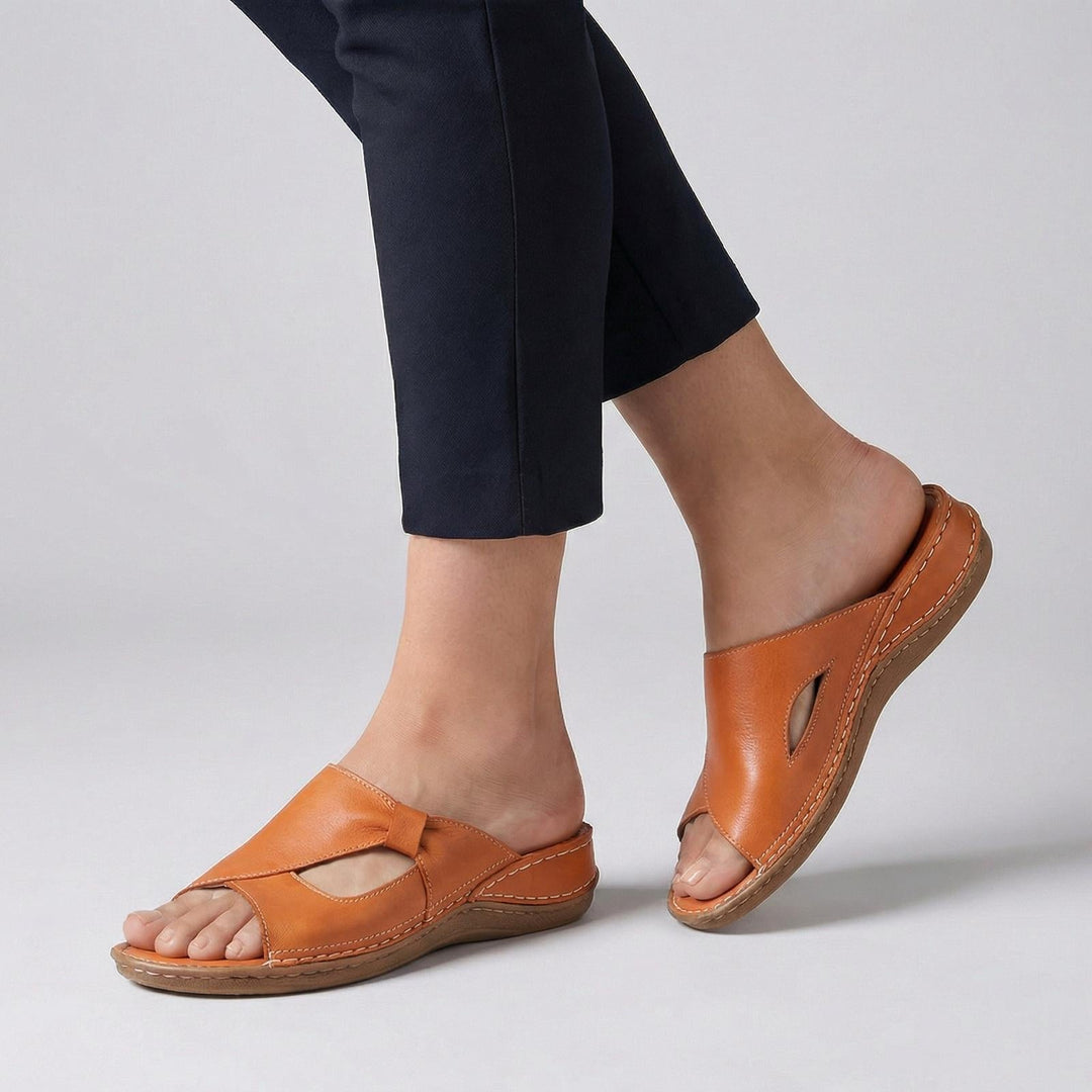 Women's sandals featuring orthopedic arch support, crafted from high-quality leather, designed for comfort with an open toe and slip-on style. 3