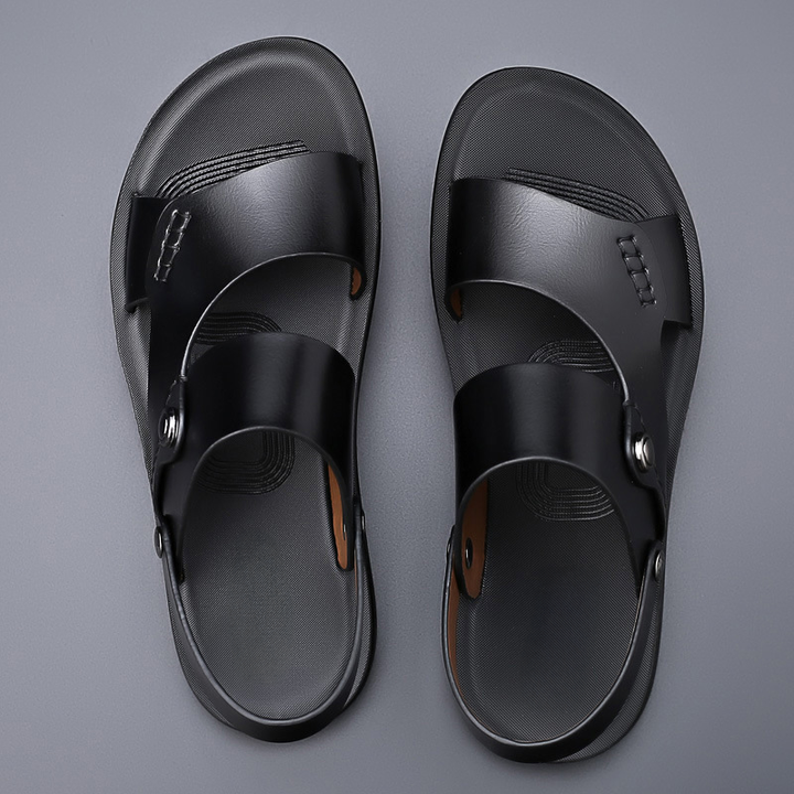 Women's sandals featuring a padded insole, crafted from lightweight vegan leather, designed for everyday comfort and style. 1