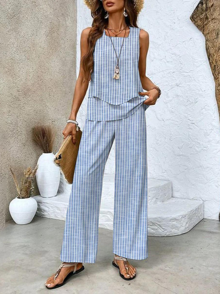 Women's summer set featuring a stylish layered top and wide-leg pants, perfect for casual outings. Lightweight and breathable fabric ideal for warm weather. 2