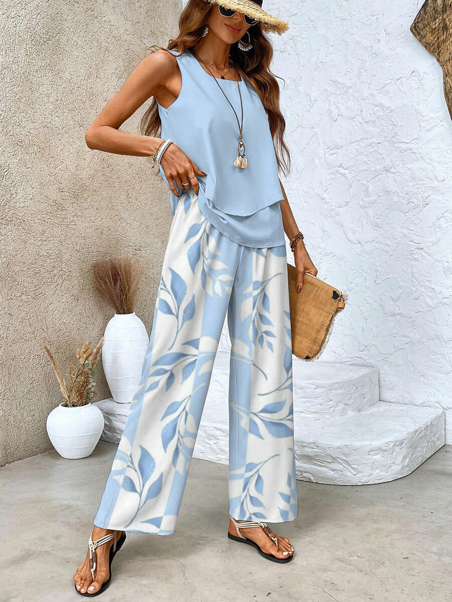 Women's summer set featuring a stylish layered top and wide-leg pants, perfect for casual outings. Lightweight and breathable fabric ideal for warm weather. 4