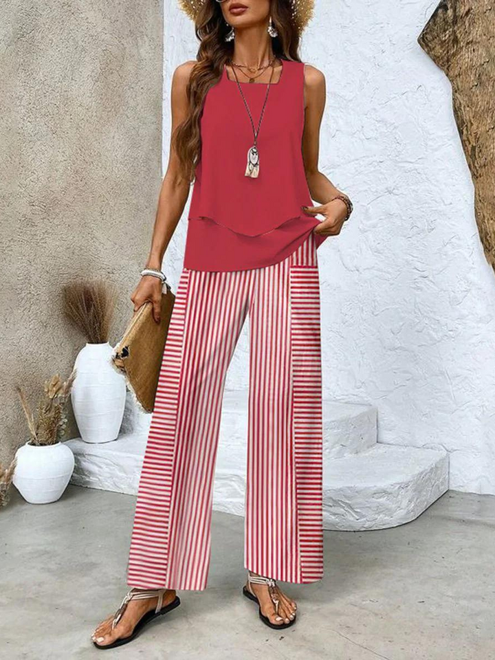 Women's summer set featuring a stylish layered top and wide-leg pants, perfect for casual outings. Lightweight and breathable fabric ideal for warm weather. 6